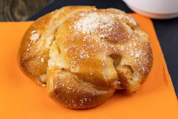 Sweet fresh bun with filling, close up