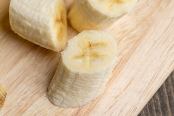 Peeled ripe yellow banana, close up