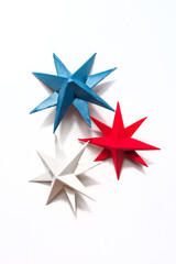 President's day.American handmade stars on white background.President's day background, holiday card. DIY festive flat lay. presidential day zero waste, paper, eco postcard.