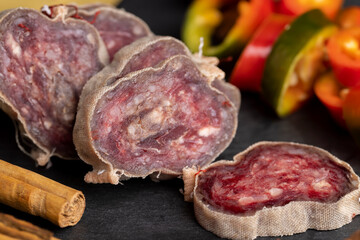 Unpeeled sliced salami using beef meat with spices