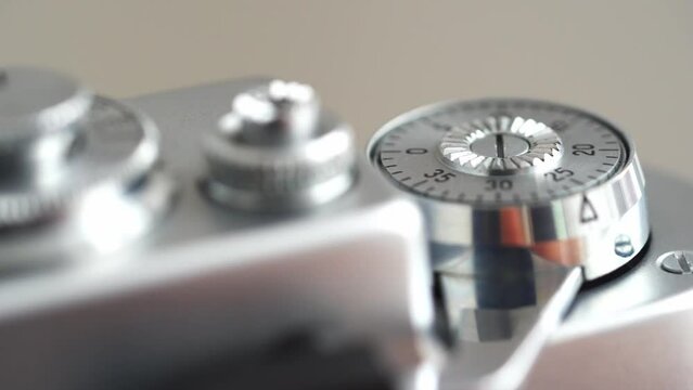 The lever for advancing the film of the camera to the cocking of the shutter.