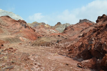 bizarre red and brown rock formation at the dry Hormuz island, Iran