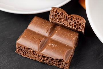 A piece of chocolate bar with air bubbles