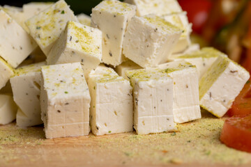 sliced white cottage cheese with spices