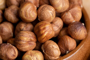 Peeled hazelnuts during cooking, close up