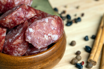 Dried pork sausage during slicing
