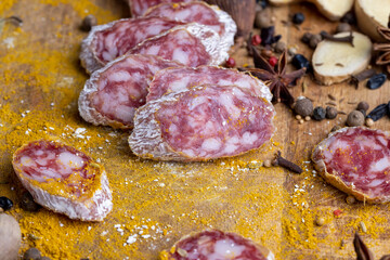 Dried veal sausage with white mold and spices