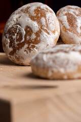 Powdered sugar gingerbread on the table