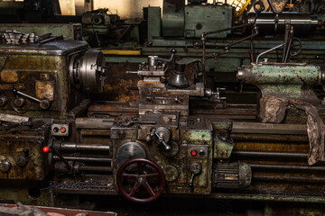 Old equipment, machines, tools in an abandoned mechanical factory