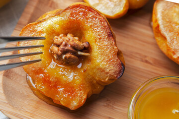 quince with honey on a plate