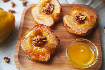 quince with honey on a plate