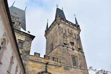 Prague, Czech Republic. Charles Bridge with its statuettes. Lesser Town Bridge Tower and the tower of the Judith Bridge.