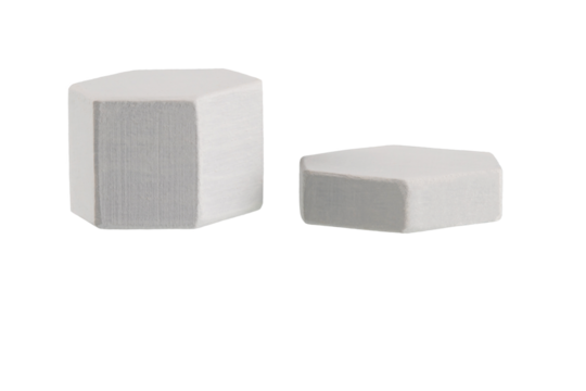 geometric figures made of wood, painted and stacked on a table, isolated