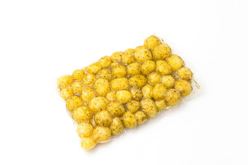 Potatoes with dill in vacuum, isolated on a white background