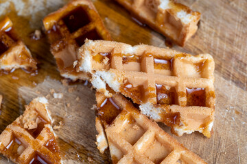 square sweet soft waffles in bee honey