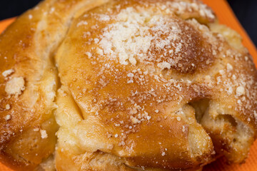 Sweet fresh bun with filling, close up