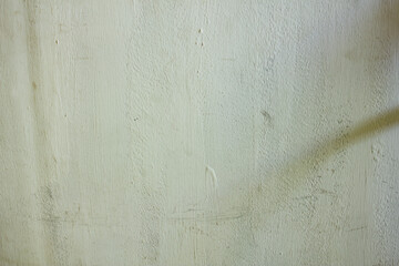 White painted wall background, with brush marks
