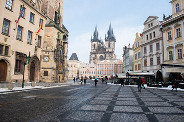 Fototapeta na wymiar Spring morning on the Old Town square with Tyn Church. Sunny cityscape in capital of Czech Republic - Prague, Europe.
