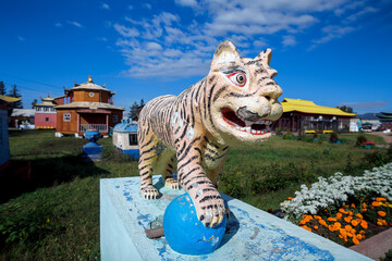 Tiger in Ivolginsky Datsan is a Buddhist temple located near the city of Ulan-Ude. Buryatia, Russia - 569673746