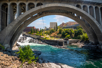 The Riverfront Park sky ride gondola ride travels over the Spokane River and Falls under the Monroe...