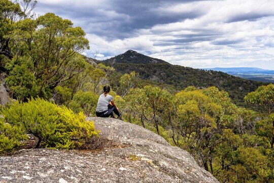 person on the top of the mountain