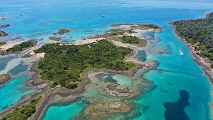 Aerial drone photo of Mediterranean paradise destination island complex with sandy organised beaches and turquoise clear sea