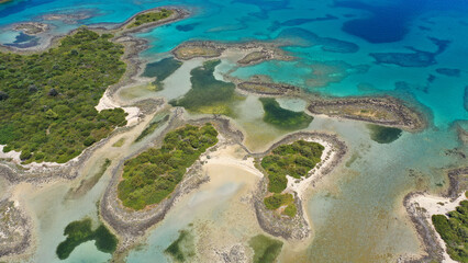 Obraz premium Aerial drone photo of paradise island complex of Lihadonisia forming beautiful beaches and a blue lagoon, North Evia island, Greece