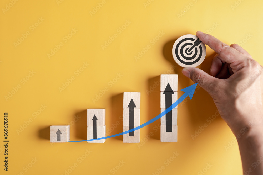 Aufkleber stock market and exchange chart concept. wooden block stack business chart or graph with arrows icon