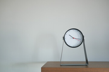 Round clock isolated on white background. 