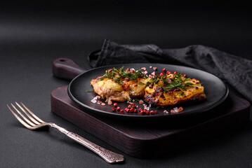 Meat baked in the oven with pineapple, tomatoes, cheese, spices and herbs