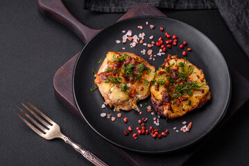 Meat baked in the oven with pineapple, tomatoes, cheese, spices and herbs