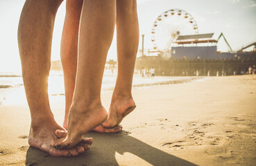 Couple in love spending time on the beach in santa monica, los angeles