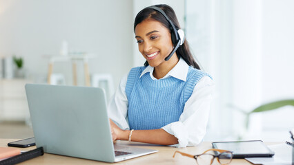 Call center agent talking to clients while wearing a headset and answering their questions while...