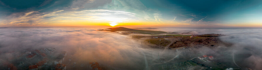 Fototapeta na wymiar city in the fog in the sunset aerial view, Burgas Bulgaria