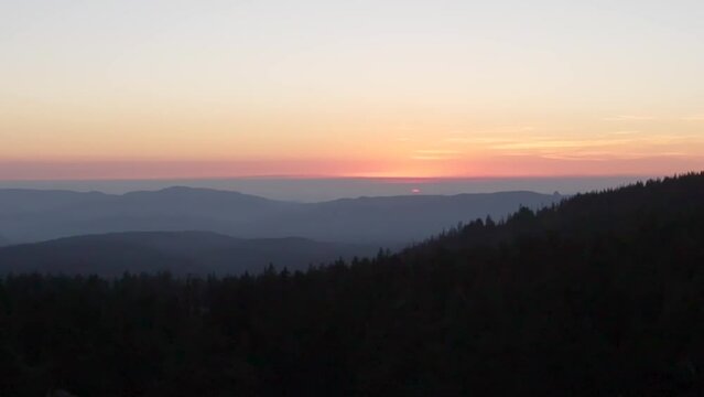 View of Sunset From Crater Lake Loop Road With Wildfire Smoke in Valleys