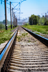 Fototapeta premium beautiful stylish and reliable railway with a train on the nature