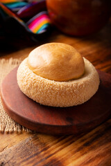 Ojo de Pancha. Also known as Ojo de Buey, it is one of the traditional Mexican sweet breads, that consist of a flaky bread ring filled with an orange-flavored pound cake.