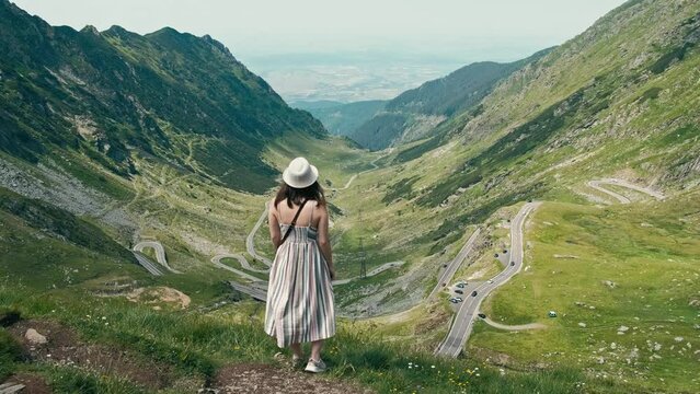 Footage of young woman enjoying beautiful time in Romanian Mountains, Transfagarasan Road, Transalpina.