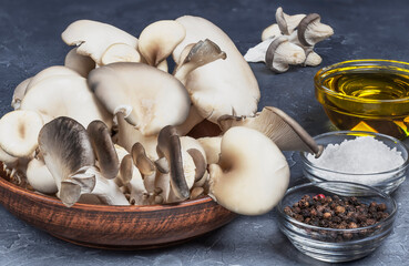 delicious organic oyster mushrooms in a bowl, top view