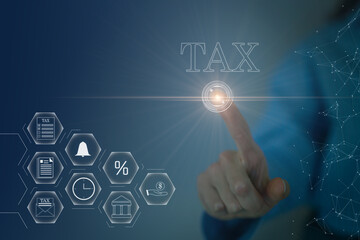 Business hand clicks virtual screen to tax return online for tax payment by corporations such as VAT, income tax, and property tax