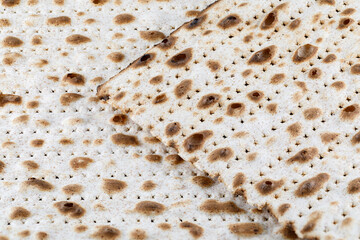 Matzah. Jewish traditional Passover bread. Pesach celebration symbol. Close-up.