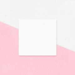 White square textured paper on white pink background, Flat lay