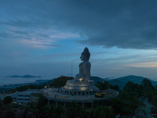 aerial view Phuket big Budha in blue twilight and red horizon..aerial photography scenery sunset at Phuket big Buddha. Phuket Big Buddha is one of the island most .important 