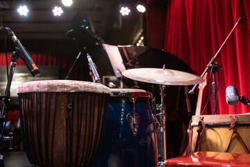 Drumming kit and professional sound set for a Jazz live concert at Latin festival in an intimate...