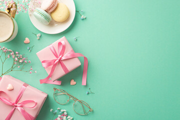 Mother's Day concept. Top view photo of pink present boxes with ribbon bows plate with macarons cup of cocoa glasses small hearts and gypsophila flowers on isolated teal background with copyspace