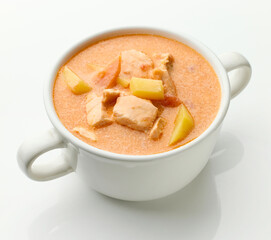 bowl of salmon and tomato soup