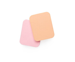 Makeup sponges isolated on white, top view