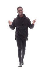 cheerful guy in autumn jacket striding forward