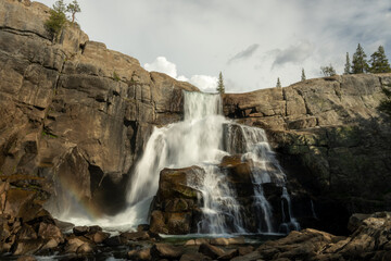 Glen Aulin Falls Tumbles Over Cliff with Rainbow