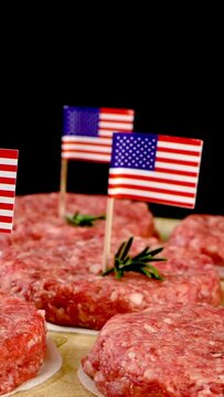 Round fresh raw mince beef burger cutlets.